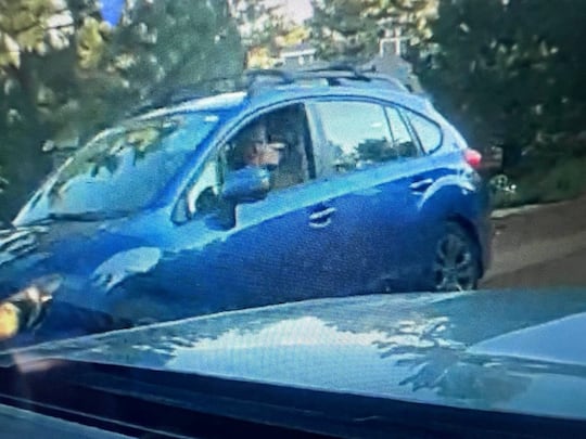 Additional photo of the potential suspect and vehicle involved.
