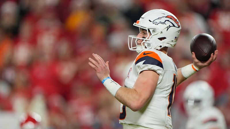 Denver Broncos quarterback Bo Nix throws a pass against the Kansas City Chiefs during the...