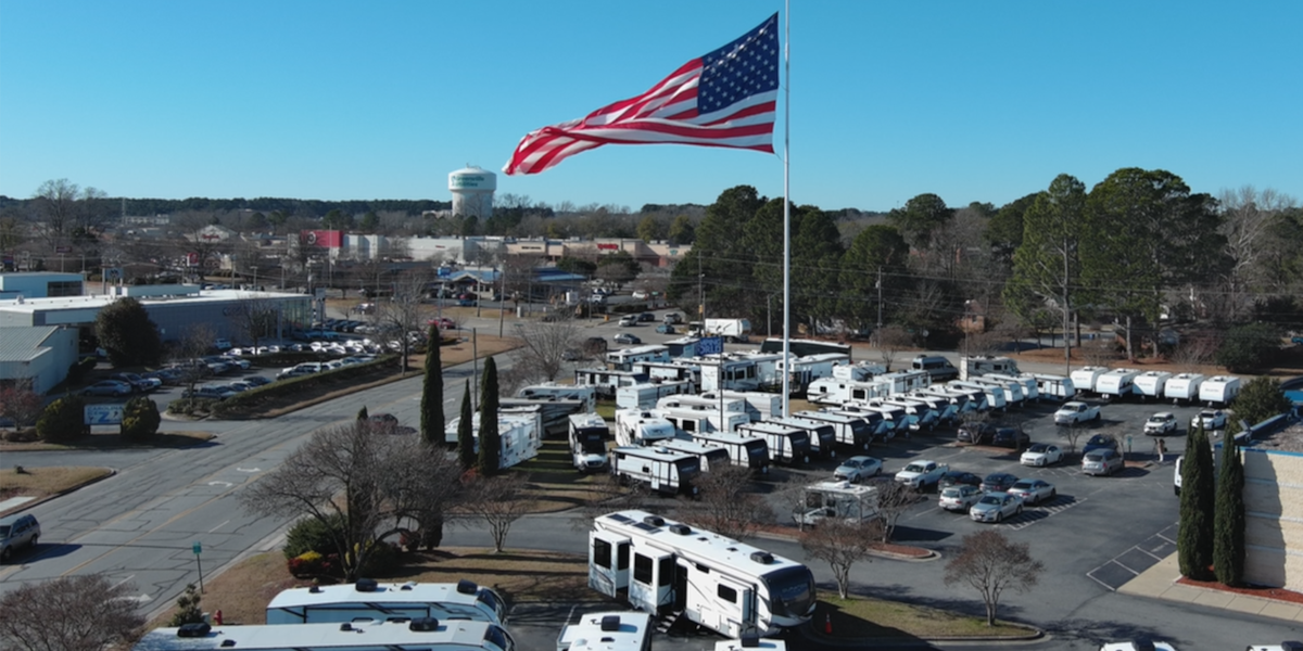 Camping World CEO says giant American flag won’t come down despite fines