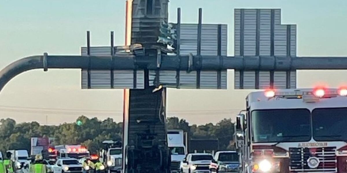 Sign Ripped Off Trailer ripped off of semi by sign on highway