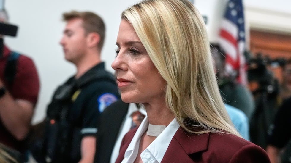 Former Attorney General Pam Bondi arrives for her deposition at the Rayburn House Office...