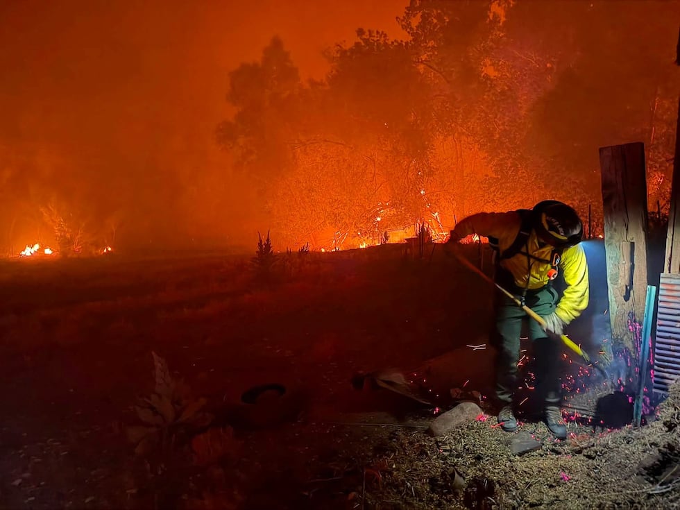 A firefighter on the front lines of the Aspen Acres Fire.
