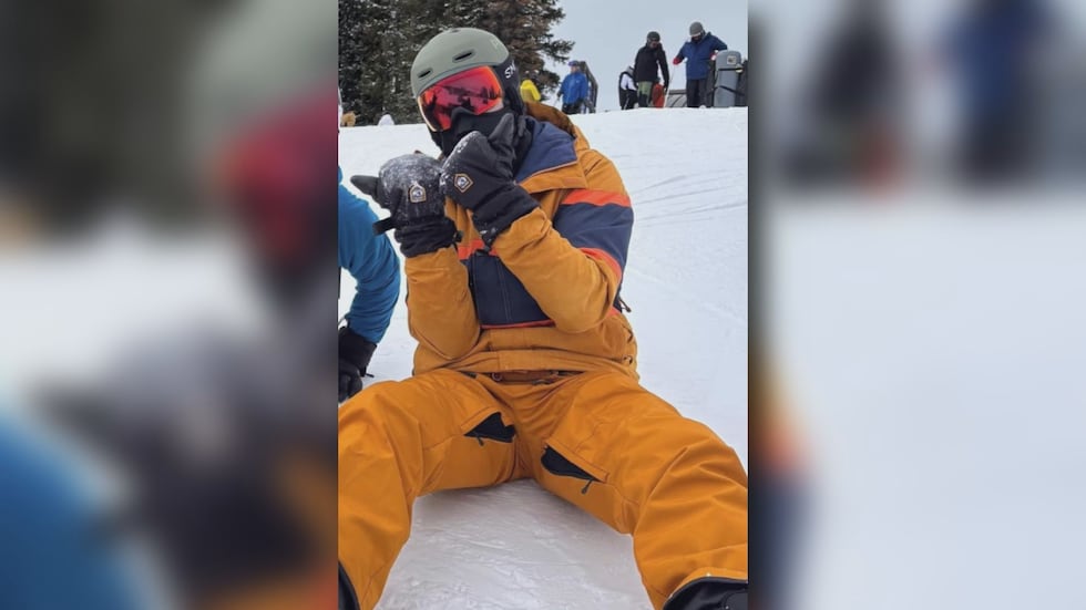 Connor Gill in snowboarding outfit
